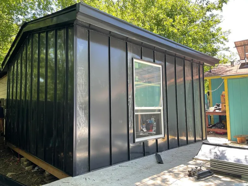 Black standing seam metal wall panels for Metal Roof Installation in Providence Village